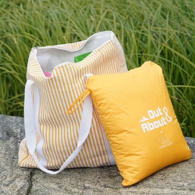 out&about dunpledd fra norsk dun i gul